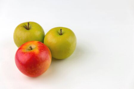 green and red apple fresh fruit in row isolated assortment clipping pat on white and black backgroundの写真素材