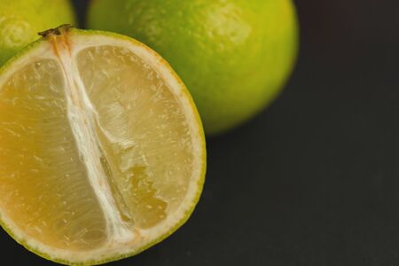 orange fresh fruit in row isolated assortment clipping pat on black backgroundの写真素材