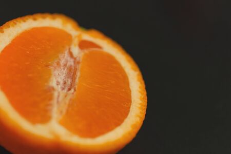 orange fresh fruit in row isolated assortment clipping pat on black backgroundの写真素材