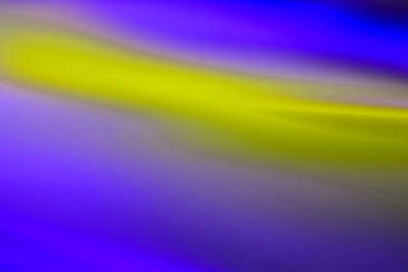 abstract night blue and yellow sky shining colorful twilight aurora pattern on colorful background.の写真素材