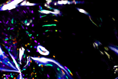 light blue neon abstract texture dark circle colorful light pattern on black background.の写真素材