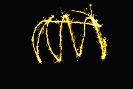 abstract line zigzag gold sparkler overlays texture elegant surface pattern on black background.の写真素材