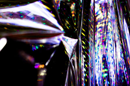 light blue neon abstract texture dark circle colorful light pattern on black background.の写真素材
