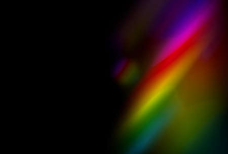 abstract dark blue sun flare overlays texture and colorful neon blur on black background.の写真素材