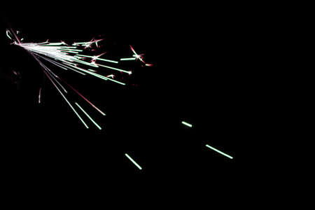 abstract white and lite blue sparkler overlays elegant texture blur sparkling on black background.の写真素材
