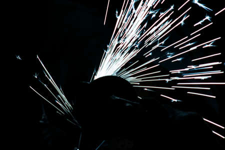 abstract white and lite blue sparkler overlays elegant texture blur sparkling on black background.の写真素材