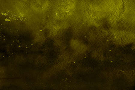 abstract grunge ink dark yellow halftone smoke effect vibrant retro painting texture with ink pastel water splash fancy pattern on dark background.の写真素材