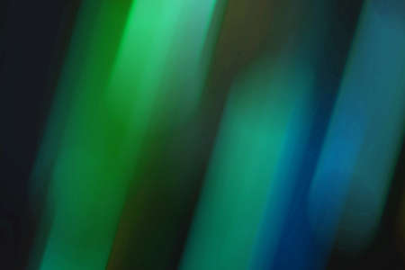 abstract dark green motion modern wave curve luxury futuristic gradient pattern with blue glowing stripe line texture on dark background.の写真素材