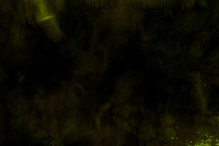 abstract grunge ink dark yellow halftone smoke effect vibrant retro painting texture with ink pastel water splash fancy pattern on dark background.の写真素材