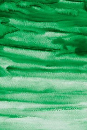 abstract watercolor soft green fluid marble sky and cloud texture with pastel stain liquid pattern on dark dark white background.の写真素材