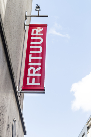 Frituur signpost at a typical Belgian chips storeのeditorial素材