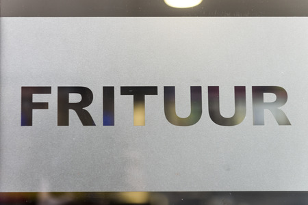 Frituur signpost at a typical Belgian chips storeのeditorial素材