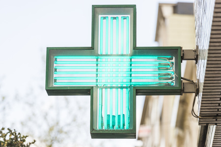 typical green signboard at a pharmacy storeの写真素材