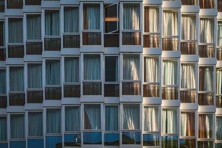 Eclectic glazed facade of an urban buildingの写真素材