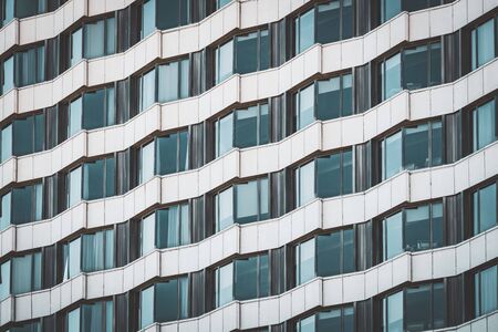 Irregular facade of an urban building creating a patternの写真素材