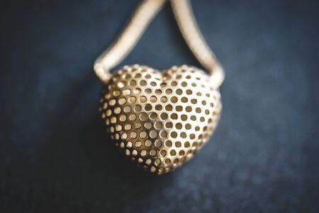 Metal mesh heart in a necklaceの写真素材