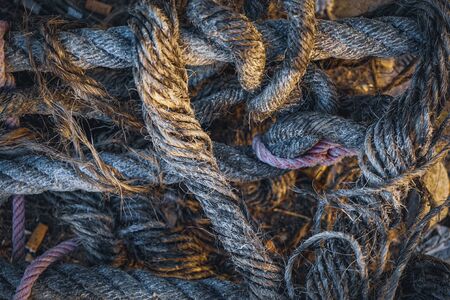 Old heap of ropes stacked untidilyの写真素材