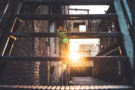 Sunbeam crossing the steps of an old factoryの写真素材