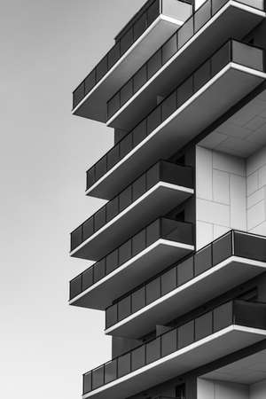 Geometric view of a residential building facade full of balconies in black and whiteのeditorial素材