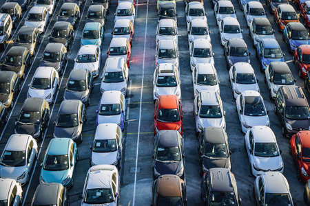 Rows of new cars waiting to be soldのeditorial素材