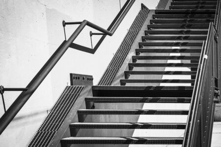 Exterior metal stairs in black and whiteの写真素材