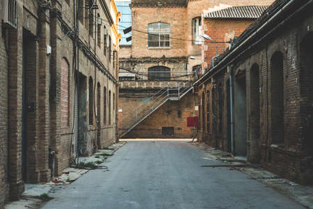 Frontal perspective of the alley of an old textile factoryのeditorial素材