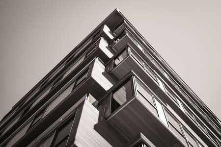 Detail of the glass balconies of a minimalist urban building - Black and Whiteのeditorial素材