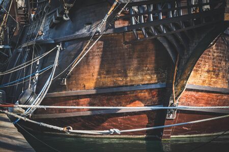 Detail of the wooden hull of an old spanish galleonの写真素材