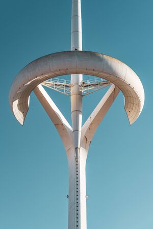 Low angle view of the structure of a white communications towerの写真素材