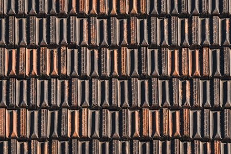 Background of traditional terracotta tiles of an old roofの写真素材