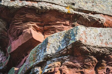 Detail of a wall made of natural sedimentary rocks also known as rodeno red bouldersの写真素材