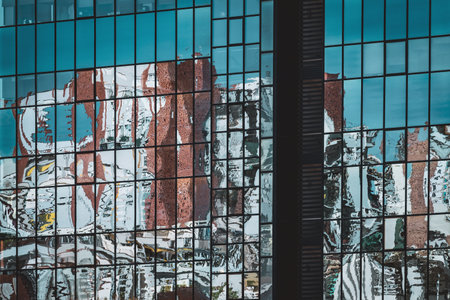 Abstract reflections on the glazed facade of an office buildingの写真素材