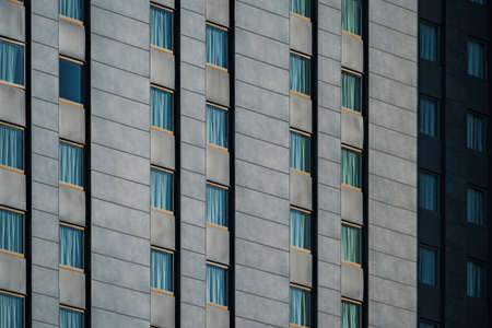 Rows of windows of an urban buildingの写真素材