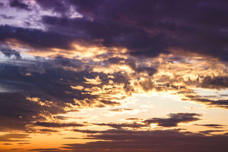 Cumulus clouds under the last lights of twilightの写真素材