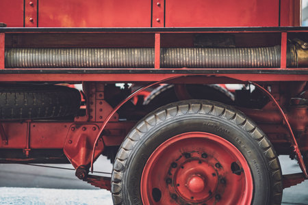 Rear wheel and hose of a classic 1929 Renault MZ fire engineのeditorial素材