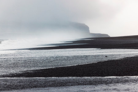 Volcanic Black Sand Beach Reynisfjara waves and fog