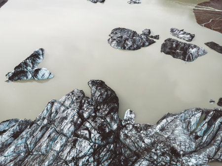 Melting glacier in Iceland, top down view of icebergs in a lakeの写真素材