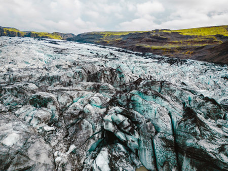 Dirt covered ice on the glacier in Icelandの写真素材