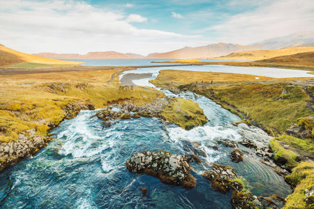 River running down to the sea, somwhere in Icelandの写真素材