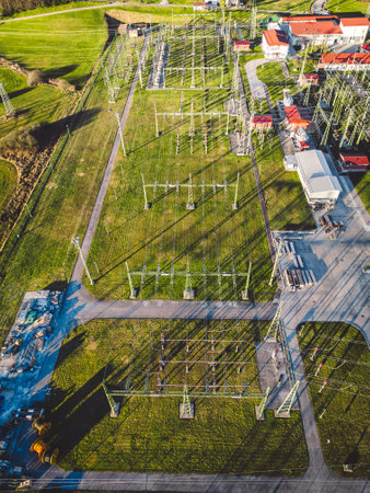 Vertical aerial view of electrical power substation somewhere in the countryside of Sloveniaの写真素材