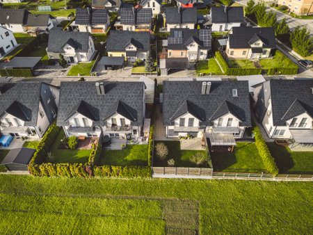 Identical homes in the suburbs, new build houses, aerial viewの写真素材