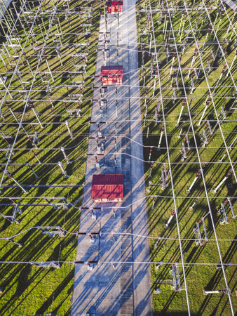Top down view of electrical wires running around at the electrical substation