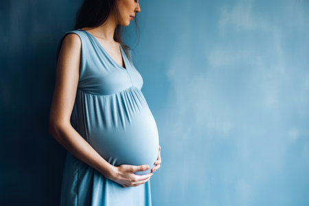 Mid section portrait of unrecognizable pregnant woman in a dress. Generative aiの素材