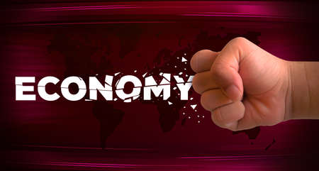 Economy Destruction with Hand Punch with Red Abstract background of world map. Modern economy destruction backdropの写真素材