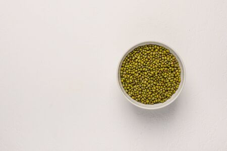 Bowl with mash on a light textured background.の写真素材