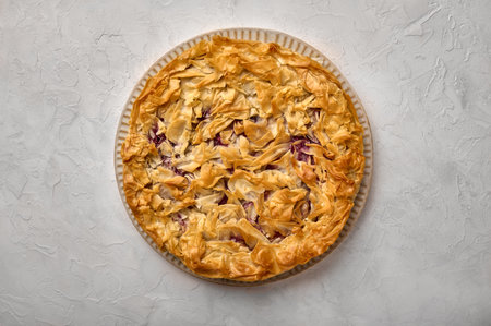 Delicious homemade cherry pie from filo dough. Top view. Copy spaceの写真素材