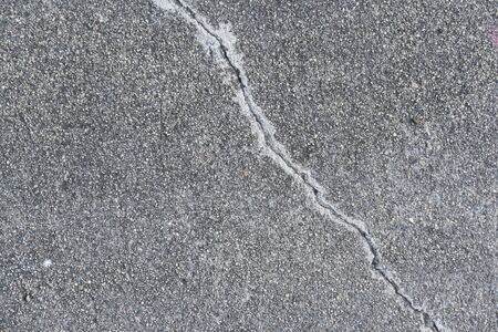 Crack on concrete surface in the streets of Los Angeles