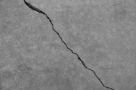 Crack on concrete surface in the streets of Los Angelesの写真素材