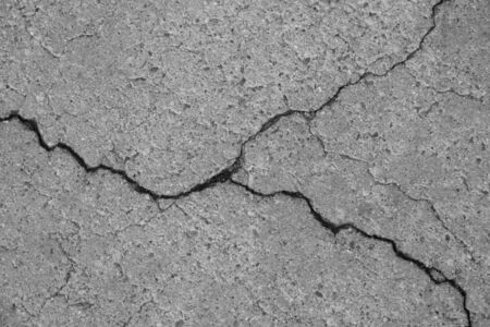 Crack on concrete surface in the streets of Los Angelesの写真素材