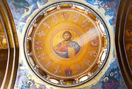 JERUSALEM, ISRAEL - DECEMBER 05, 2015: Interior and Dome of Holy Sepulchre Cathedral with Jesus Mosaic, Jerusalemのeditorial素材